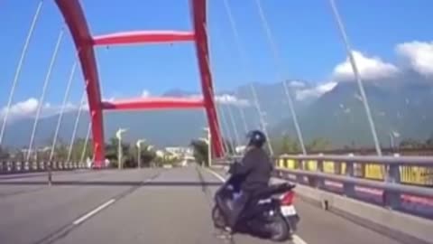 Biker got stuck on a bridge during 7.2 magnitude earthquake