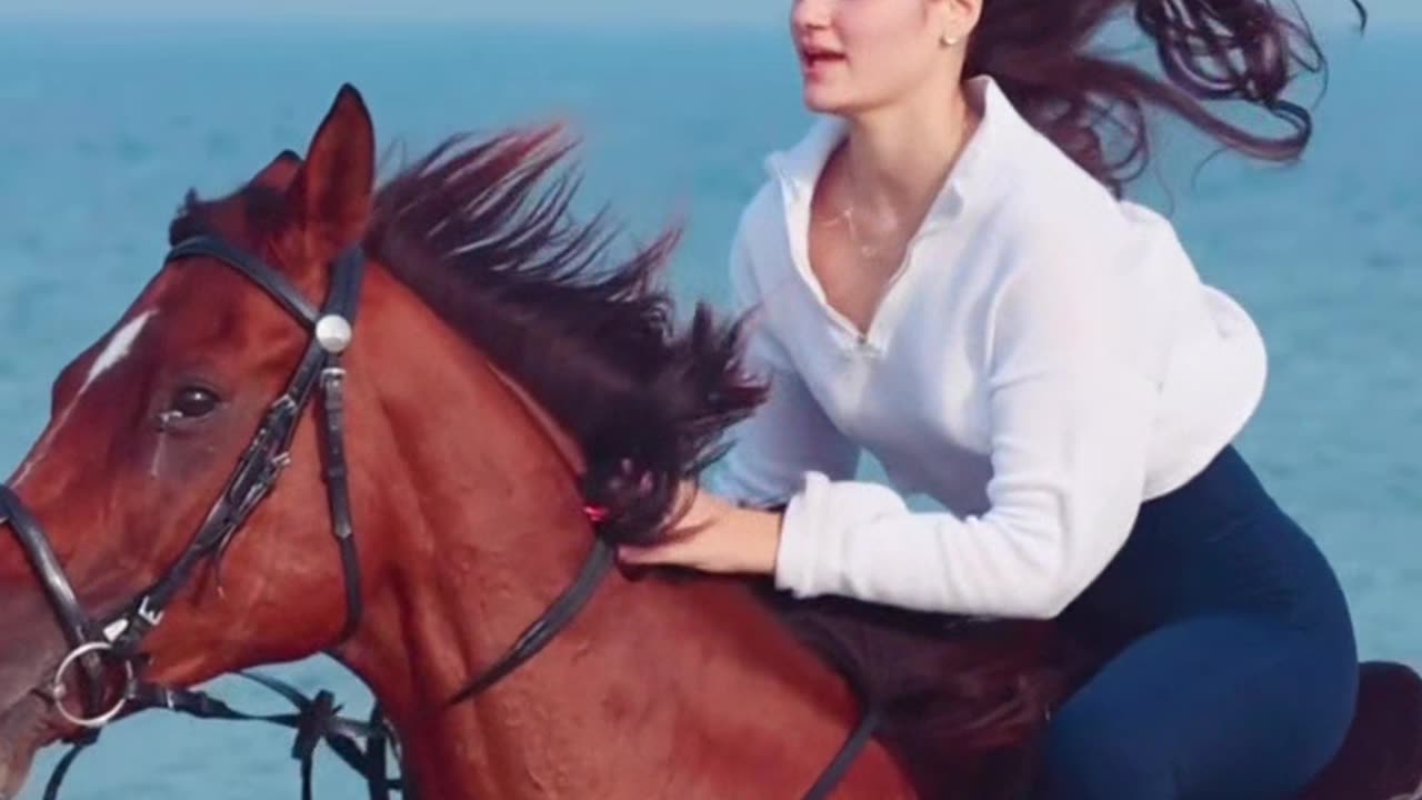 Girl riding horse