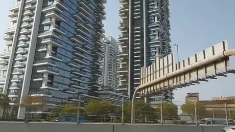 Two buildings connected at the top Dubai