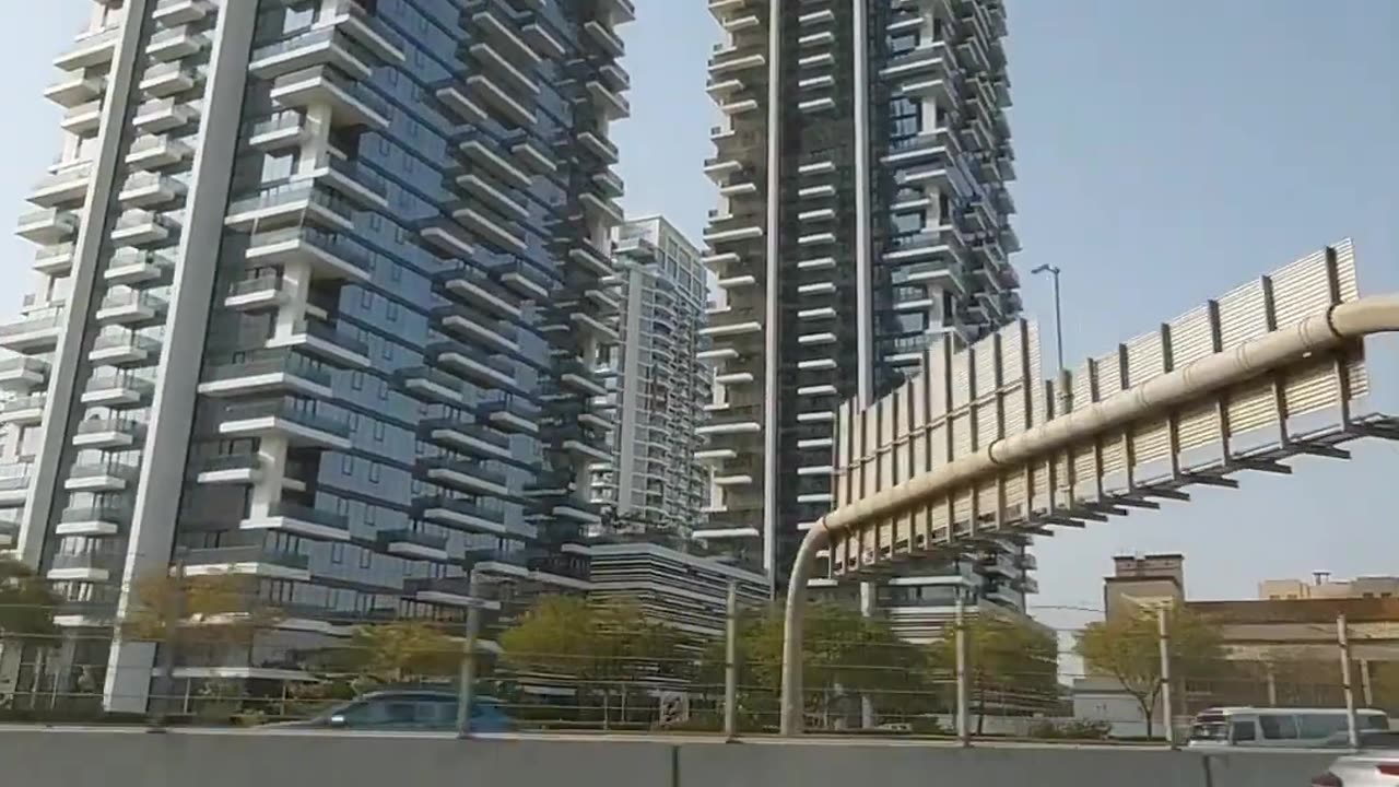 Two buildings connected at the top Dubai