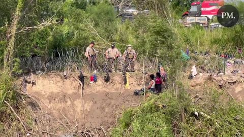 Texas DPS turns two male migrants who are carrying children back to Mexico