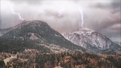 Lighting Flashes and Rain Over Mountains