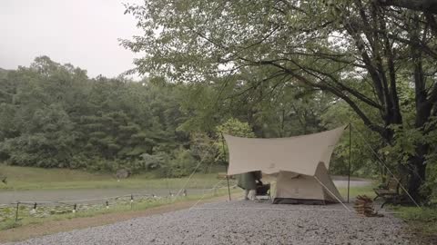 A tent was set up beside the fish pond to camp