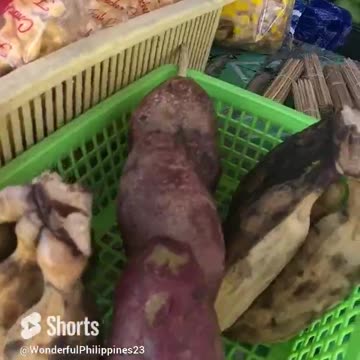 Beachside Bites: Trying Filipino Street Food Snacks on the Shore.