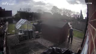 Wind Blows Shed Door Hitting Husband on the Head