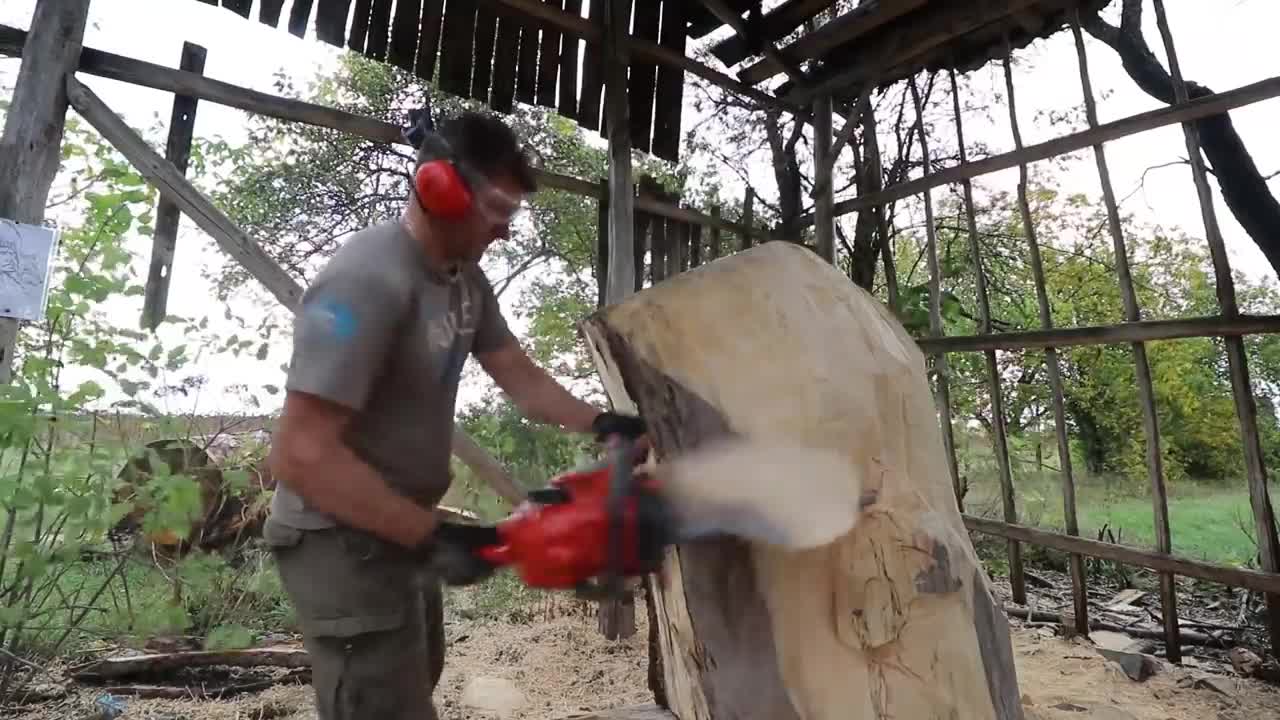 AMAZING CHAINSAW wood carving, Native American with wolves