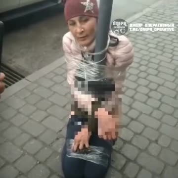 Ukraine Russia War Woman Tied To Pole Pants Pulled Down For Stealing Looting