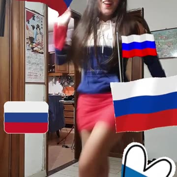 Dancing, with Russian flags, to a song about Moscow