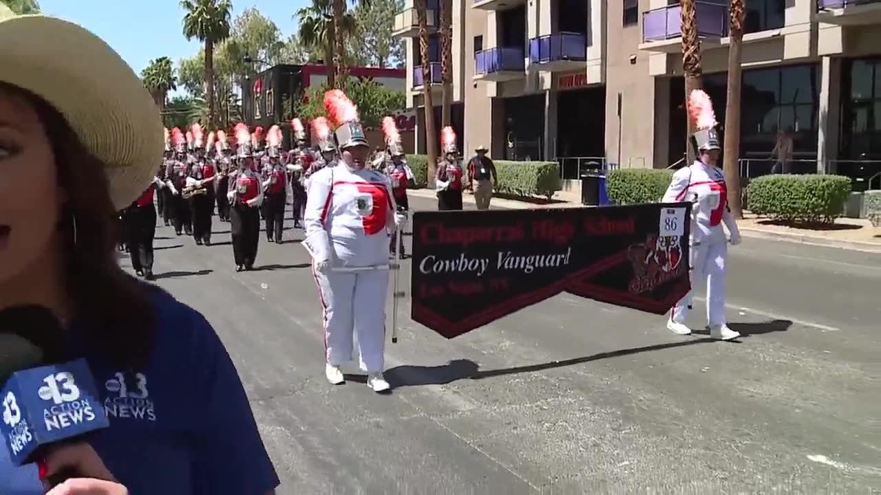 Kelsey McFarland talks to parade spectators