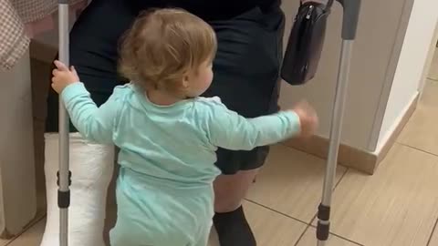 Toddler Helps Injured Dad to Sit Down