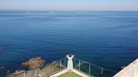 wide sea and narrow space and woman