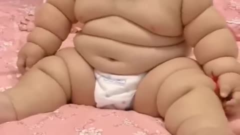 Cute fat baby baby laughing hard