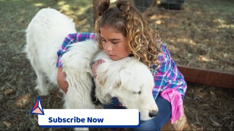 Girl Holding Dog