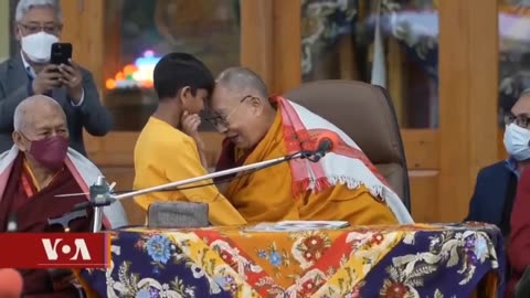 Globalist supporting pedophile, the Dalai Lama orders a child to suck his tongue...