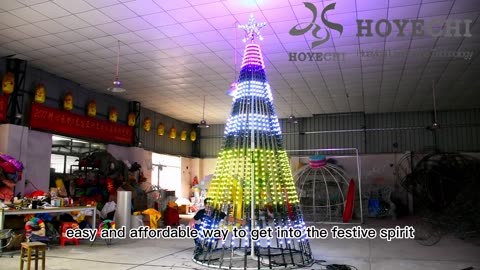 The installation of a programmed LED Christmas tree