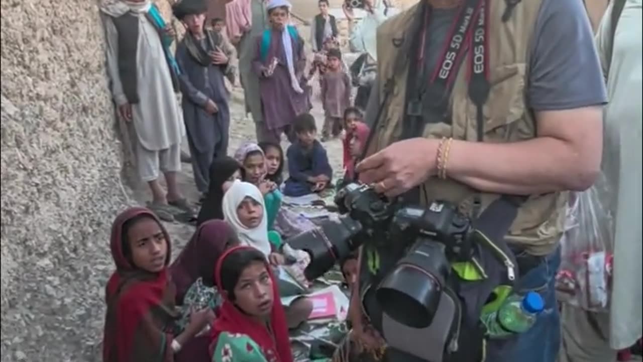 Young man gives donations to poor people