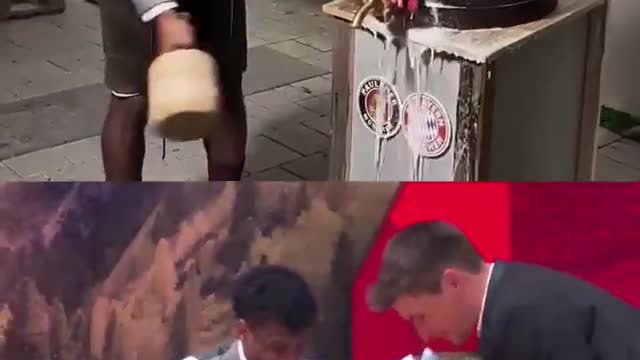 Kingsley Coman taps the beer barrel