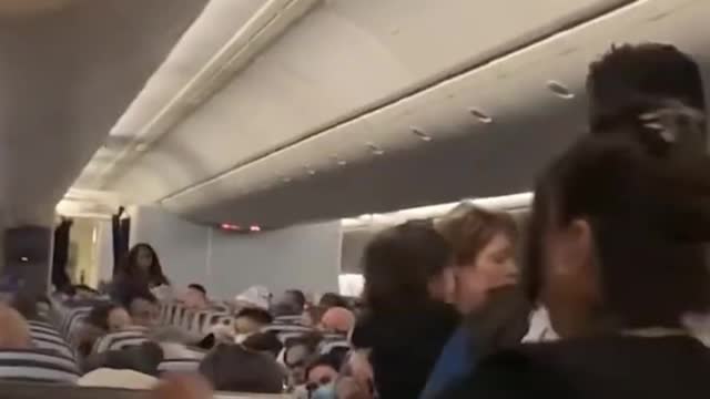 Woman Allegedly Shoves And Threatens Flight Attendant