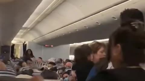 Woman Allegedly Shoves And Threatens Flight Attendant