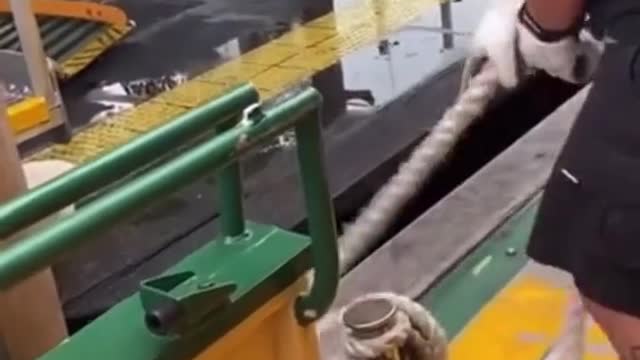 Check out this ferry worker's skills!