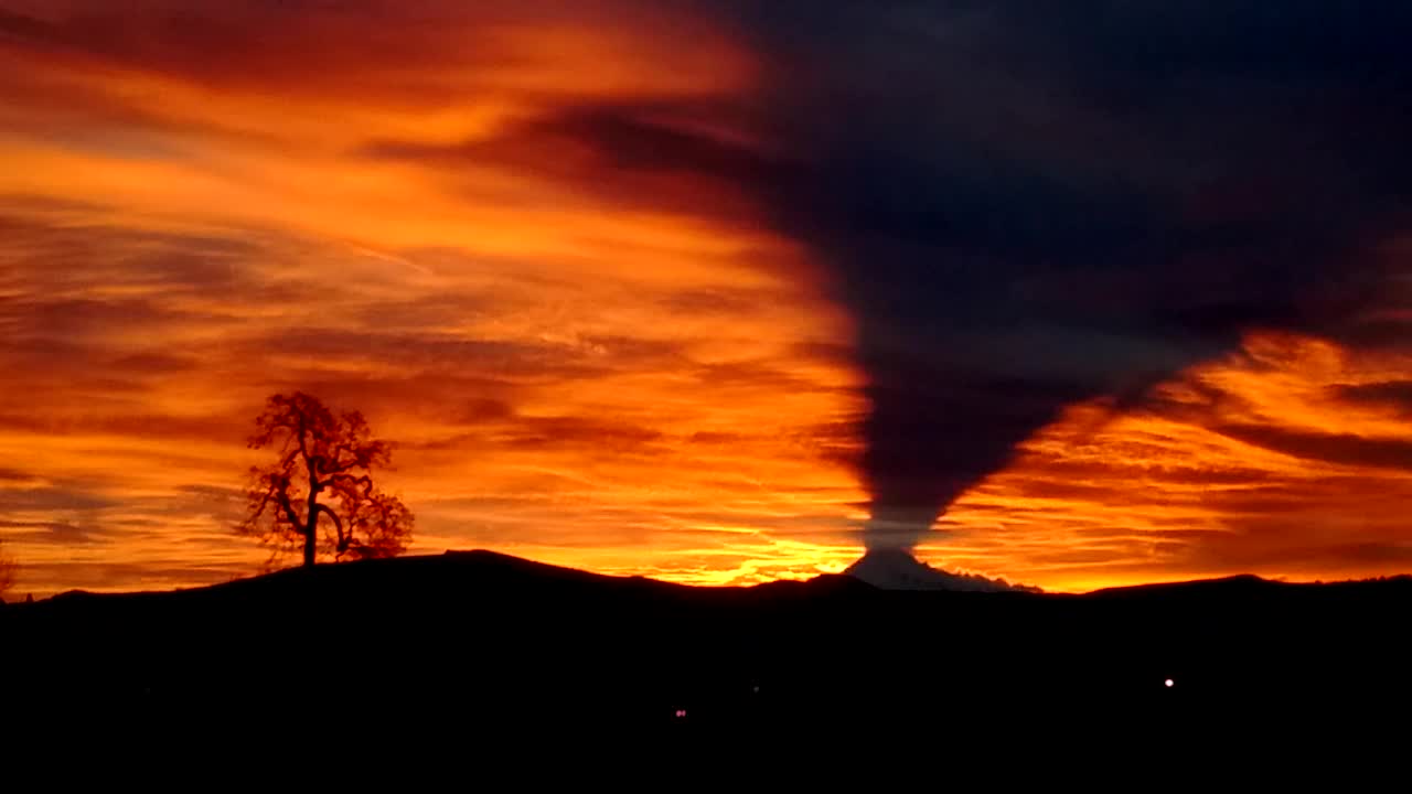 Mt. Hood Sunrise Casts Shadow On The Clouds
