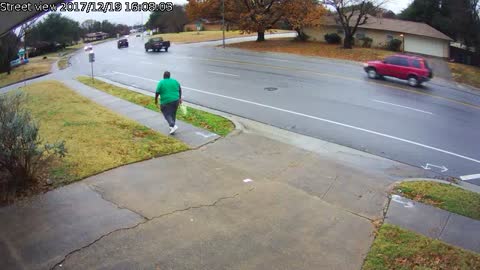 Driver Loses Control on Wet Road