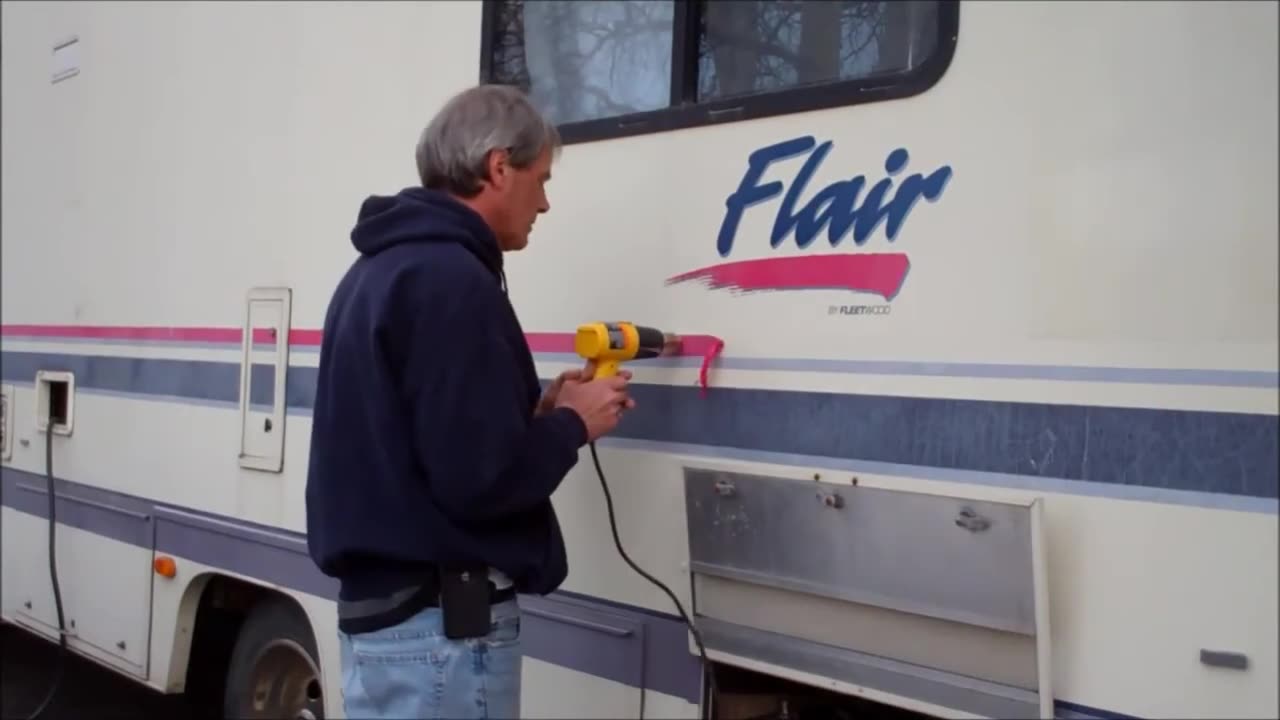 Removing the faded red (pink) decals off the motorhome