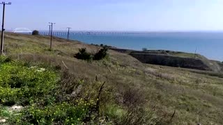 Cars queue to leave Crimea after bridge blast