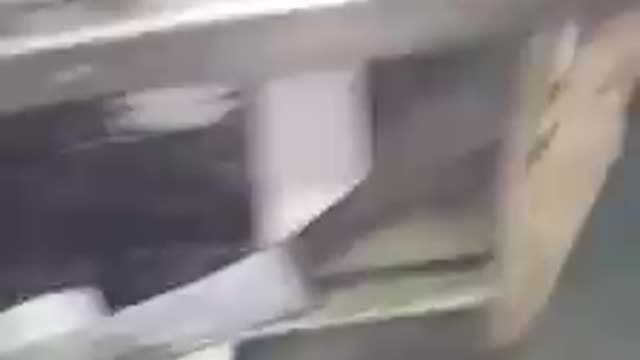 Cleaning a bracket on belt sander