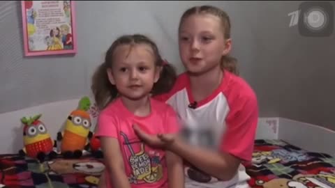 Little girl gives international hand sign for being abused