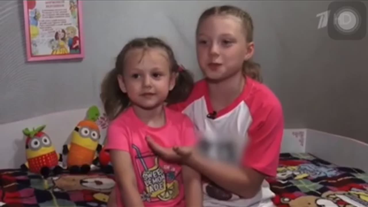 Little girl gives international hand sign for being abused