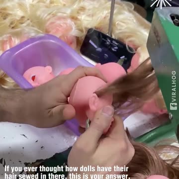 The process of sewing doll hair!.hd