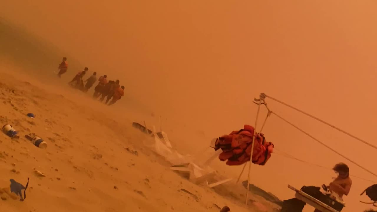 Beachgoers Caught Off-Guard By Sudden Sandstorm