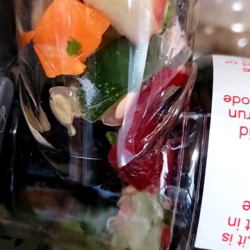 Press juicer. Making colorful juice with extra veggies