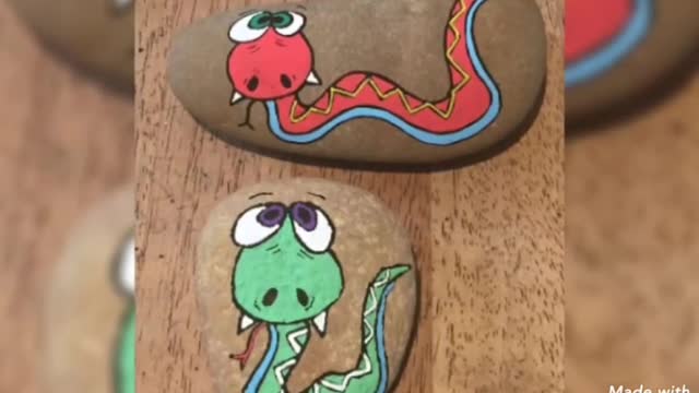 lovely mosnter painting on rocks and pebble