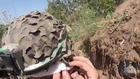 Field Medic Assisting a Ukrainian Soldier