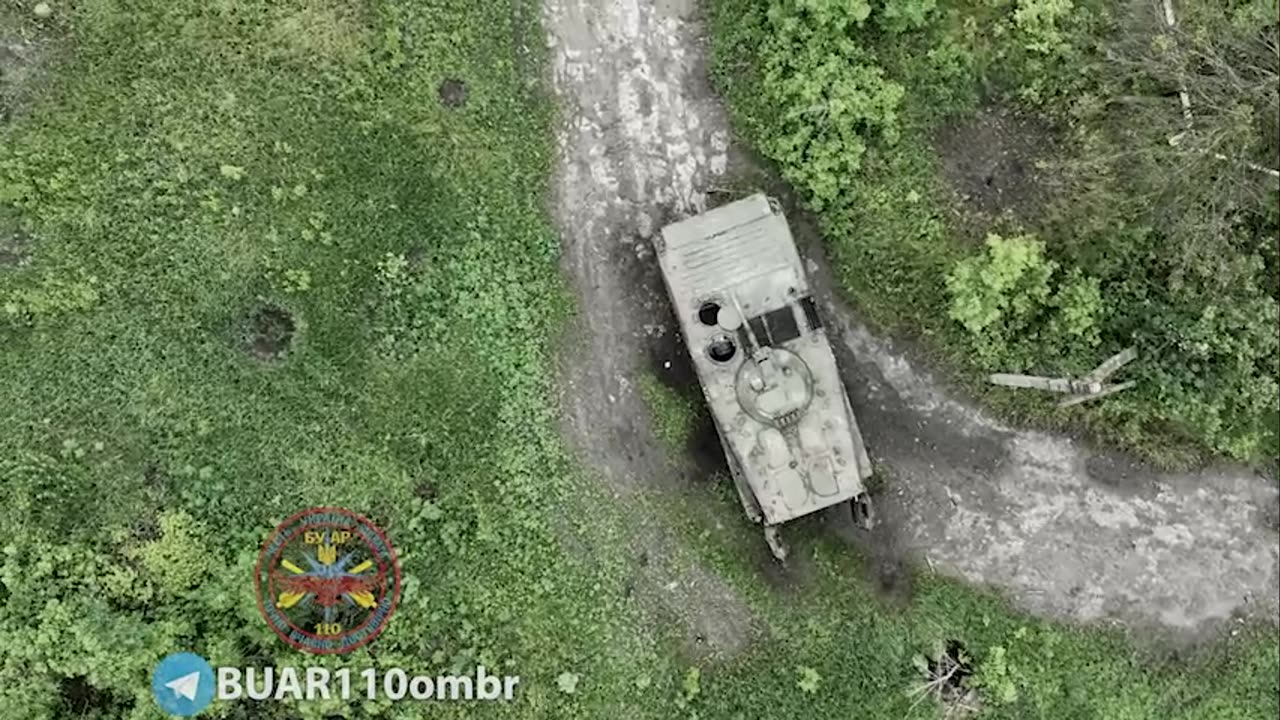 Dropping Grenades onto Russian APC