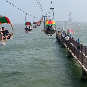 Chairs lift in sea enjoy people's