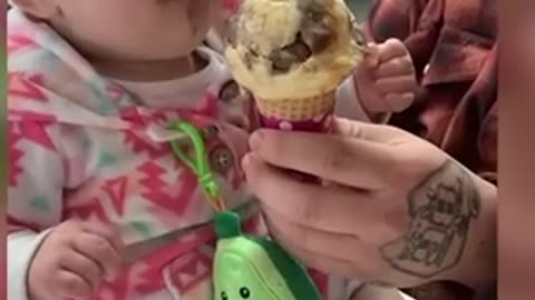 cute baby esting icecream