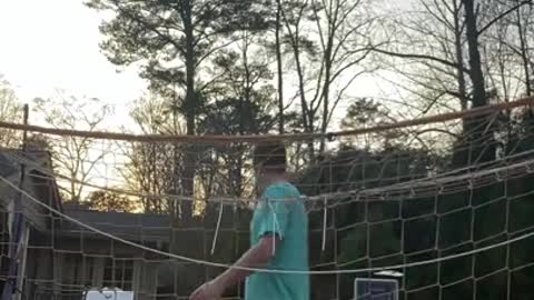 Guy Makes Impressive Basketball Shot By Kicking Ball Stuck In Net