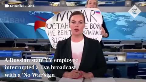 Anti-war protester interrupts Russian state TV news broadcast