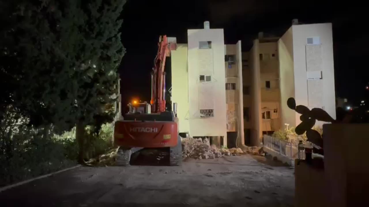 A residential building in Haifa that sustained heavy damage from a direct rocket