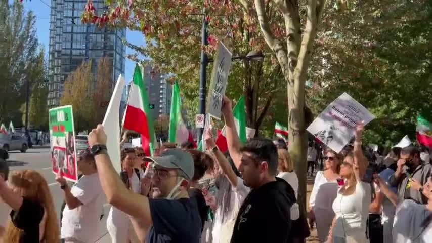 Protestors in Vancouver sing along to Iranian pro-freedom song.