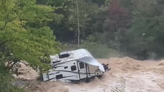 Camp Trailer Stuck in River Flood Waters