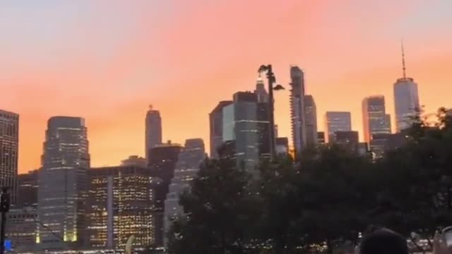 Watching the sunset and enjoying the free movies under the Brooklyn Bridge