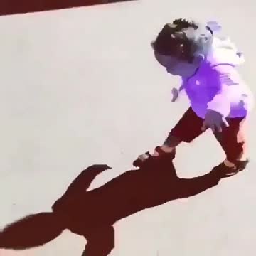 A girl running from her shadow