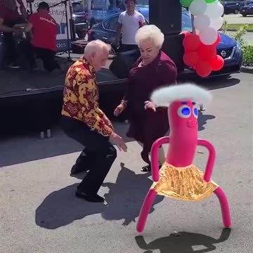 COUPLE DANCING TO THE RHYTHM