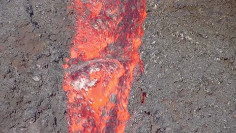 Hot Lava Flows Near Beach Shore