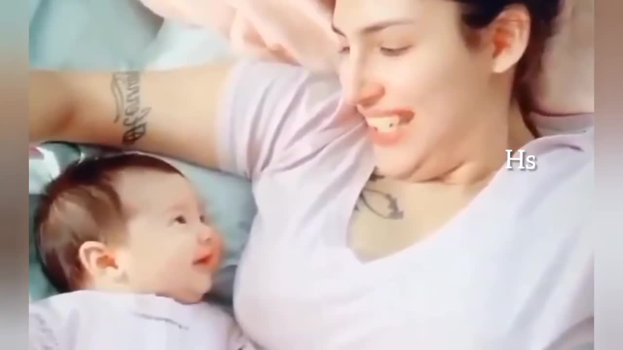 Adorable baby looking at her mom so cute baby