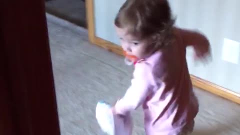 Mischievous Baby Girl Throws ALL Of Her Clothes Over Railing